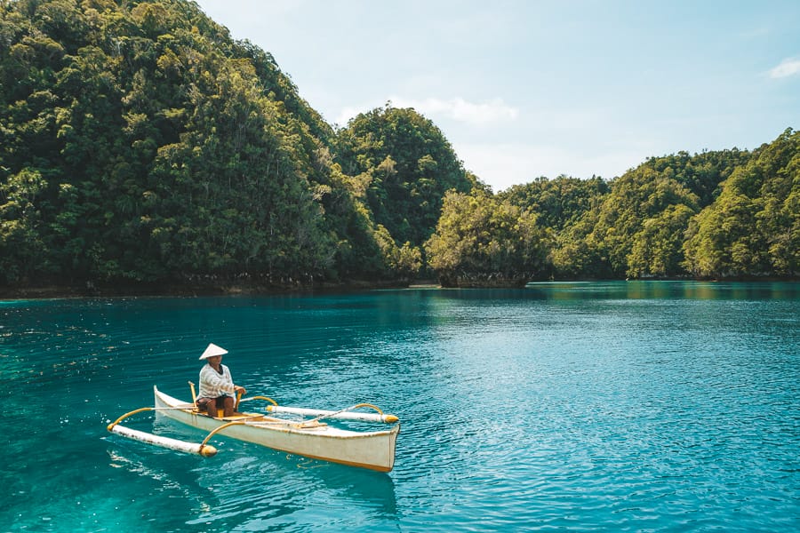 "a man in a boat at Sohoton Cove"